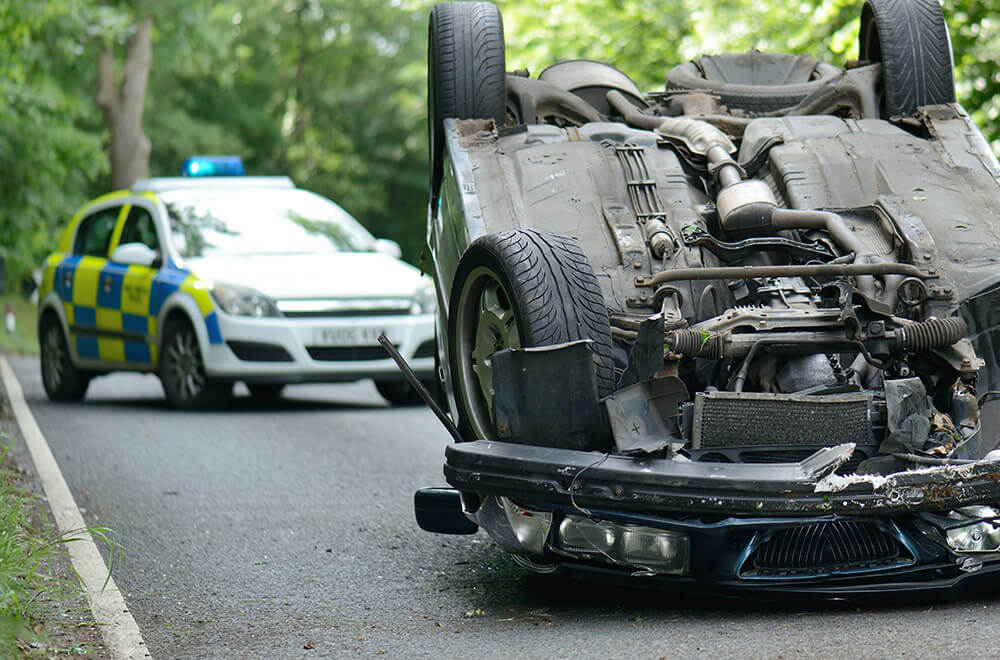 Police attending an accident involving a hit and run driver