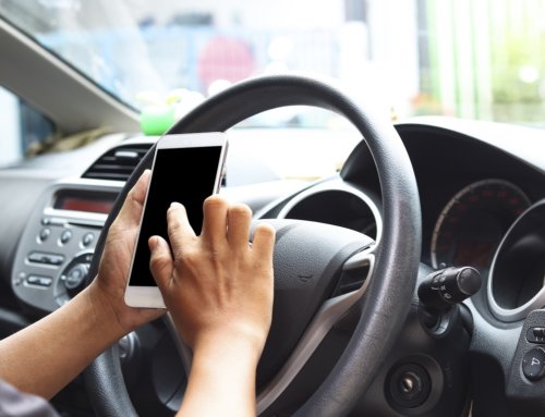 Is using a mobile phone whilst driving as unacceptable as drink driving?