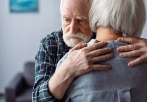 loving couple hugging after traumatic brain injury