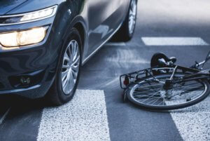 car and cyclist