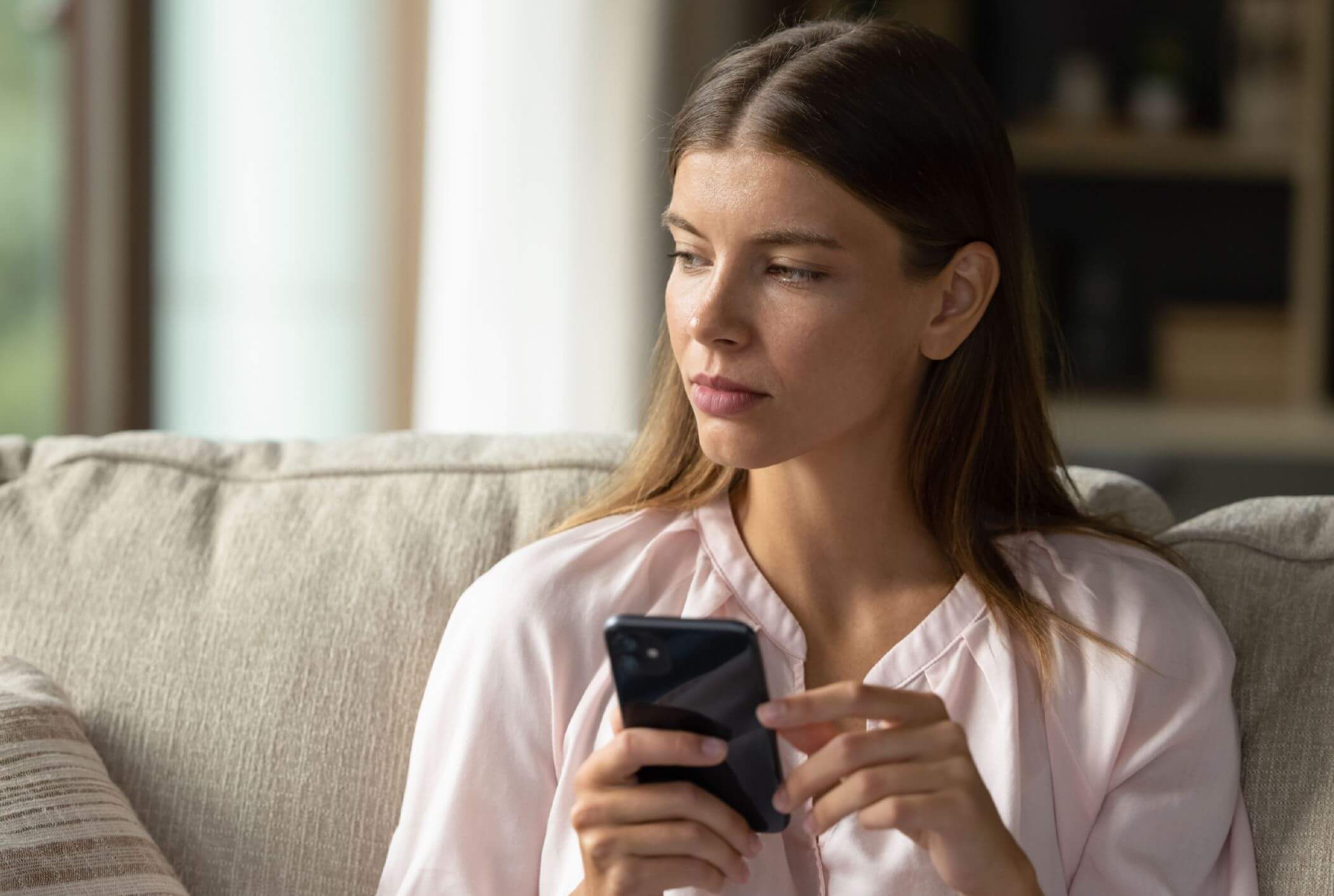 woman thinking about which personal injury solicitor to choose