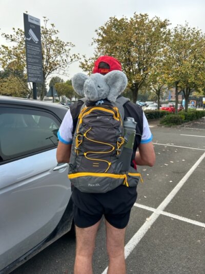 carl waring and george the elephant in rucksack