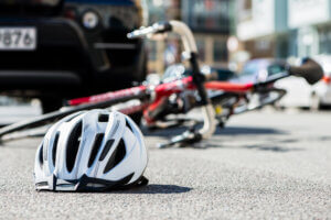 Overturned bicycle on busy road