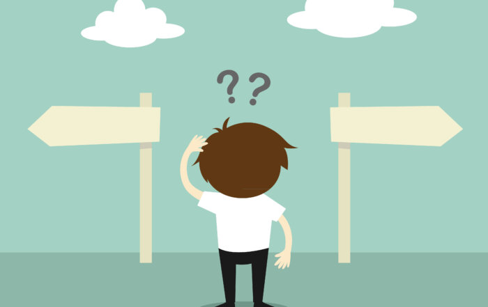Cartoon image of man looking confused at signpost