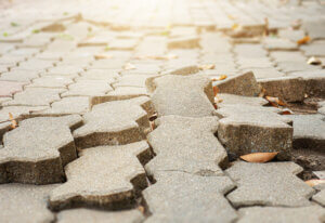 Close up of uneven paving stones.