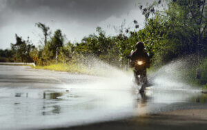 Motorcycle on flooded road