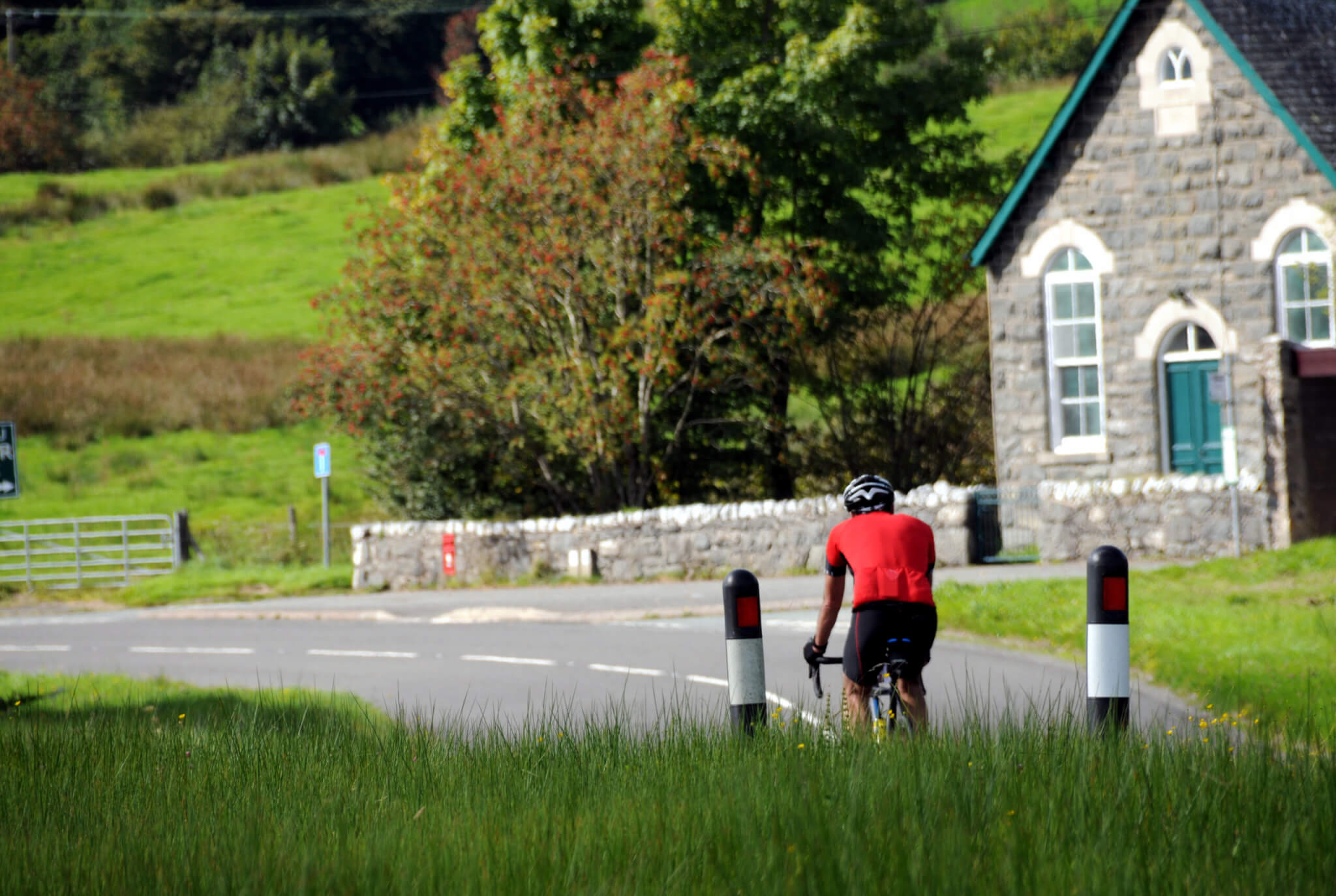 Cyclist on UK country road.