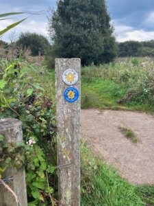 Wales Coastal Path marker in Margam Country Park