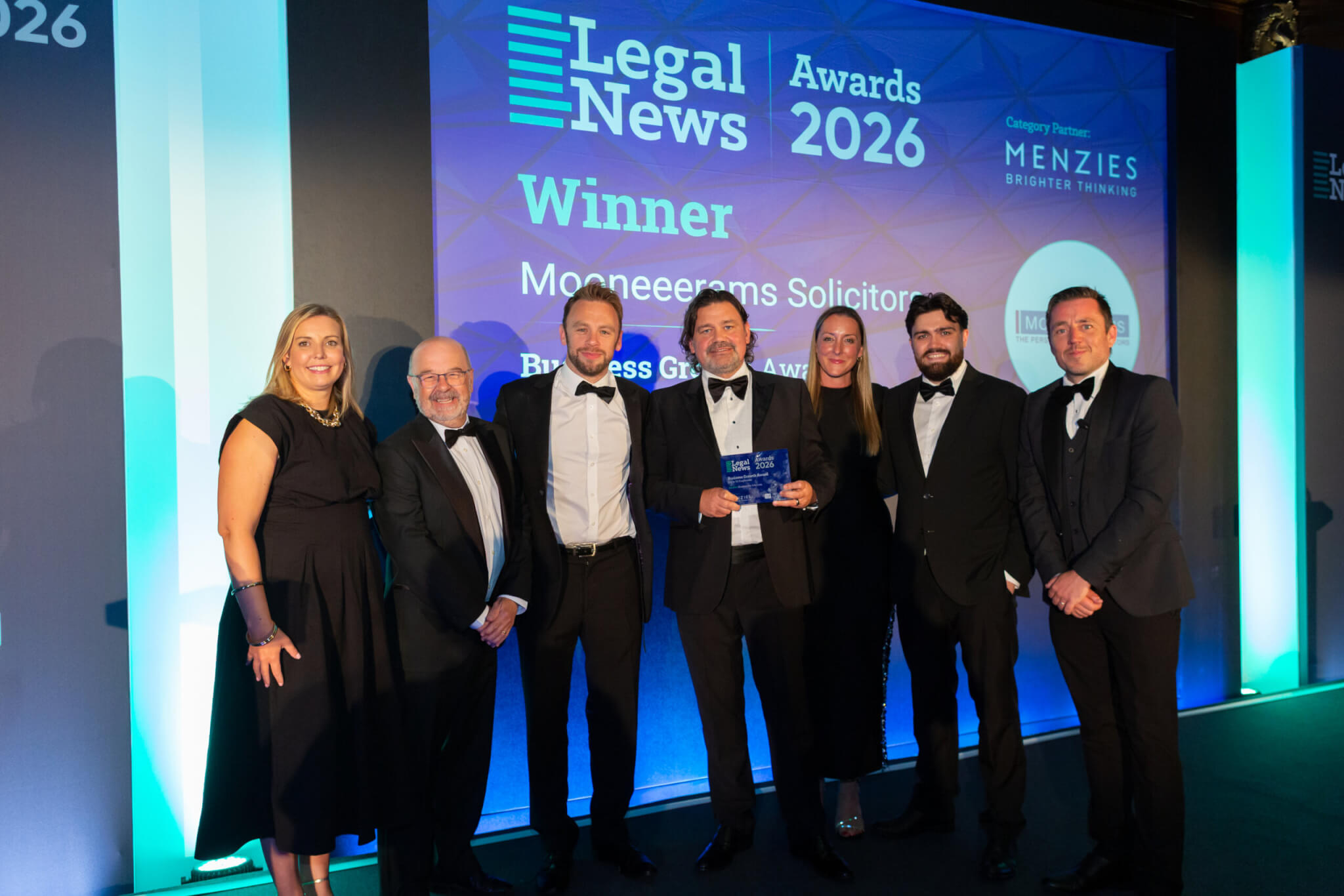 Mooneerams team accepting award at the Legal News Wales Awards 2026 Mooneerams team accepting award at the Legal News Wales Awards 2026