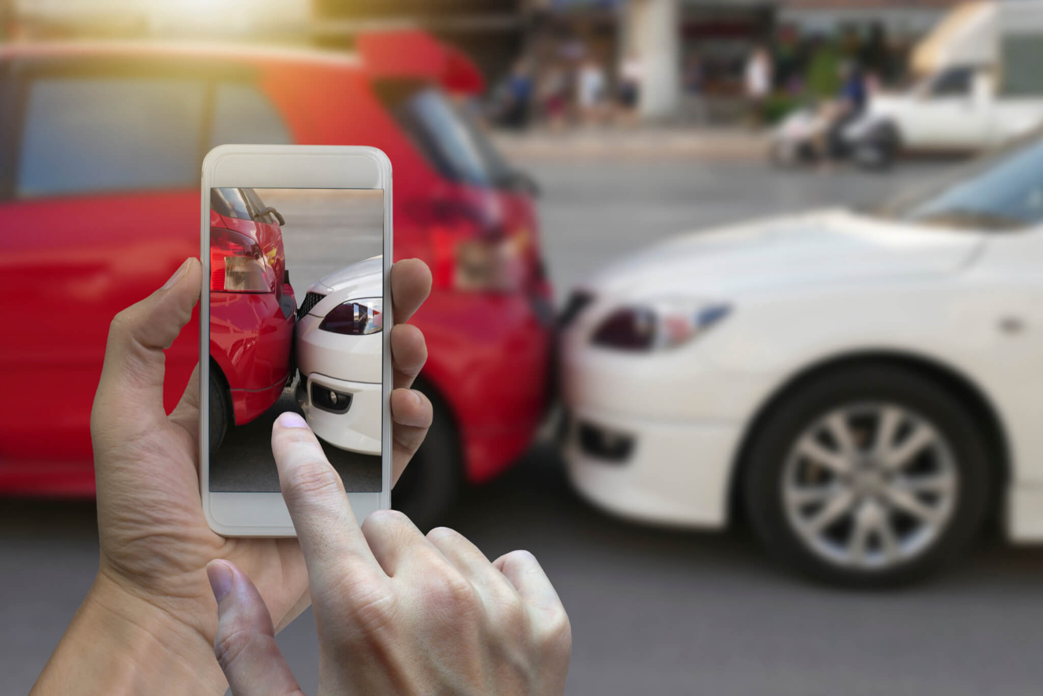 Taking a photo of a car accident Taking a photo of a car accident